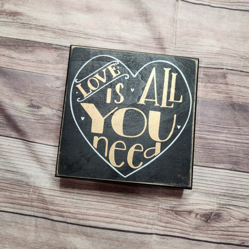 Primitives by Kathy Black and Gold 'Love Is All You Need' Heart Wall Plaque